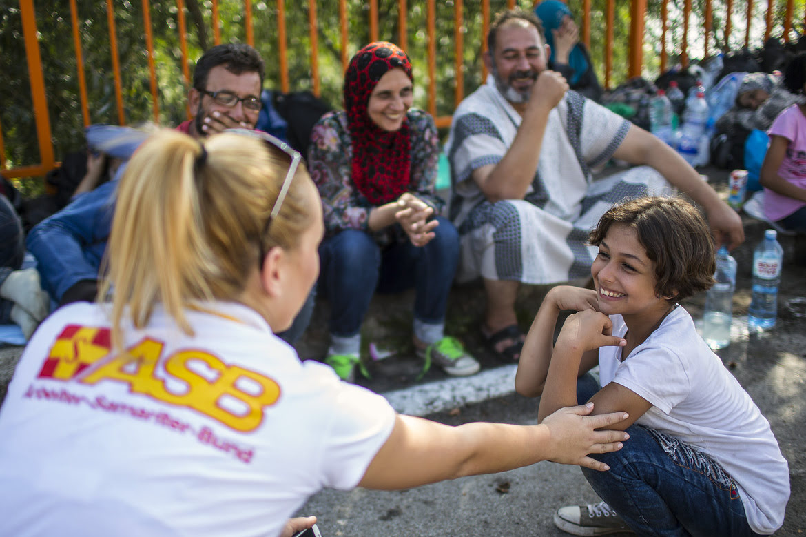 Serbia-ASB team member with children at.jpg
